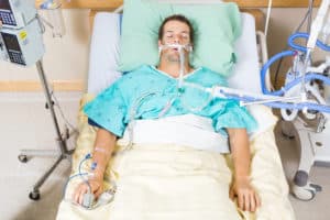 Man in hospital bed needs a health care surrogate